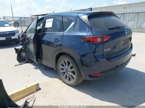 JM3KFADM3M0488996 — 2021 Mazda CX-5, foto 3 de IAAI, Vuelco