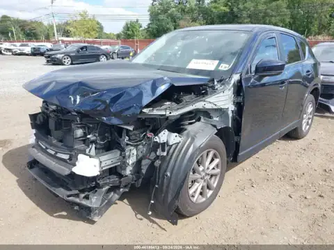 JM3KFBCLXS0648738 — 2025 Mazda CX-5, photo 2 from IAAI, Front end
