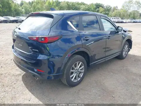 JM3KFBCLXS0648738 — 2025 Mazda CX-5, photo 4 from IAAI, Front end