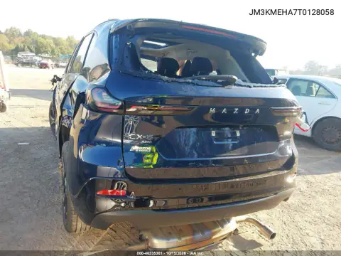 JM3KMEHA7T0128058 — 2026 Mazda CX-5, foto 4 de IAAI, Parte delantera y trasera