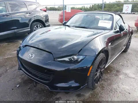 JM1NDAC73R0609007 — 2024 Mazda MX-5, photo 2 from IAAI, Left side