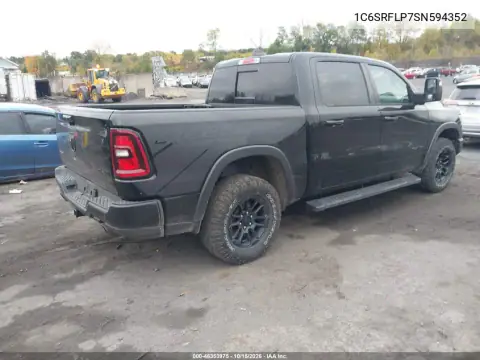 1C6SRFLP7SN594352 — 2025 RAM 1500, photo 4 from IAAI, Left side