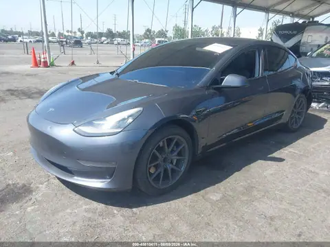 5YJ3E1EA9JF045401 — 2018 Tesla Model 3 Long Range/Mid Range, photo 2 from IAAI 22.10.2026, Left rear
