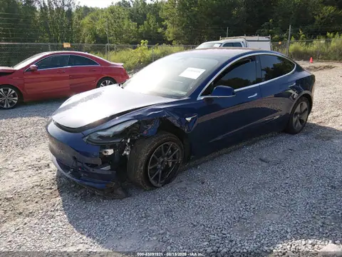 5YJ3E1EA5JF058999 — 2018 Tesla Model 3 Long Range/Mid Range, photo 2 from IAAI 15.10.2026, Left front