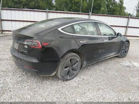 5YJ3E1EB1JF070852 — 2018 Tesla Model 3 Long Range/Performance, photo 4 from IAAI 15.10.2026, Hail
