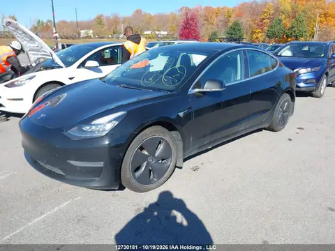 5YJ3E1EB4KF393827 — 2019 Tesla Model 3 Long Range/Performance, фото 2 з IAAI 26.10.2026, Лівий бік