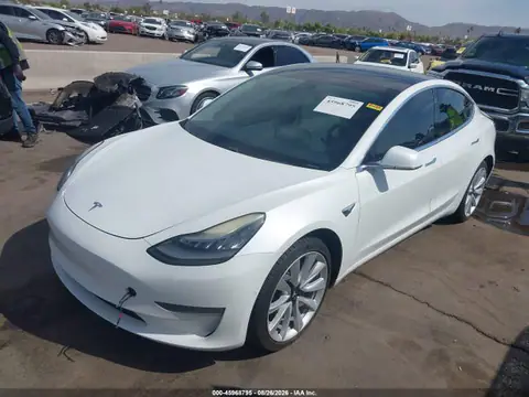 5YJ3E1EBXKF494757 — 2019 Tesla Model 3 Long Range/Performance, photo 2 from IAAI 20.10.2026, Rear end