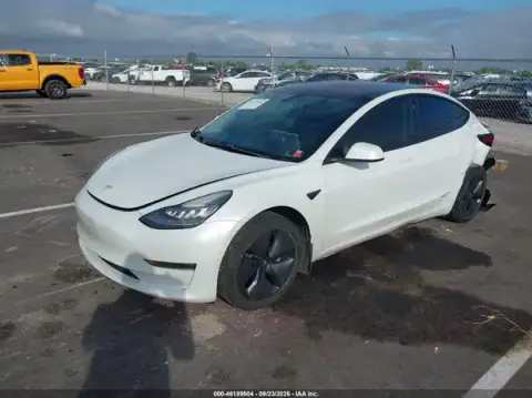 5YJ3E1EB7JF151287 — 2018 Tesla Model 3, photo 2 from IAAI, Left rear