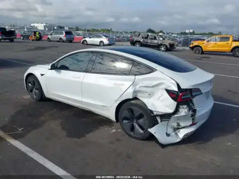 5YJ3E1EB7JF151287 — 2018 Tesla Model 3, photo 3 from IAAI, Left rear
