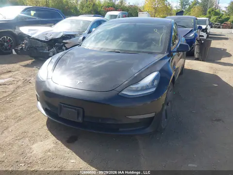 5YJ3E1EA7MF848499 — 2021 Tesla Model 3, photo 2 from IAAI 27.10.2026, Left side