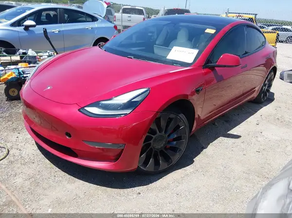 5YJ3E1ECXMF082933 — 2021 Tesla Model 3, photo 2 from IAAI 13.10.2026, Undercarriage damage