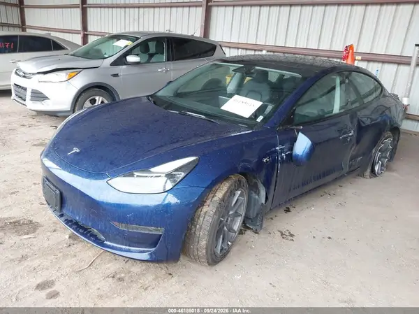 5YJ3E1EB0NF145403 — 2022 Tesla Model 3, photo 2 from IAAI, Left side