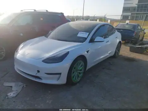 5YJ3E1EB7PF391870 — 2023 Tesla Model 3, zdjęcie 2 z IAAI 20.10.2026, Tył