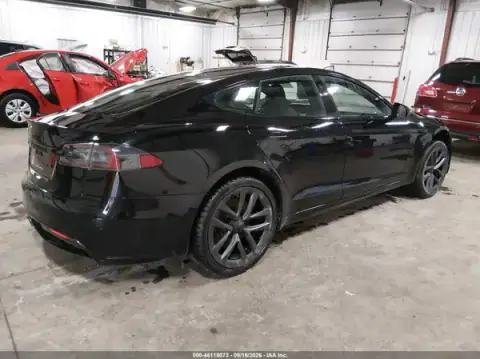5YJSA1E57MF430129 — 2021 Tesla Model S, photo 4 from IAAI, Left side