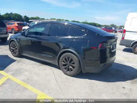 7SAXCDE5XPF372929 — 2023 Tesla Model X, photo 4 from IAAI 22.10.2026, Repossessed