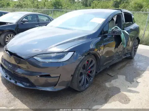 7SAXCBE69SF467343 — 2025 Tesla Model X, фото 2 с аукциона IAAI, левый бок