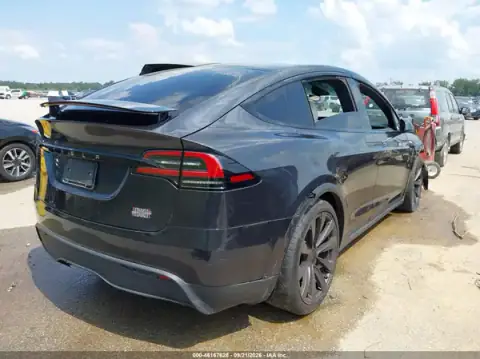 7SAXCBE69SF467343 — 2025 Tesla Model X, фото 4 с аукциона IAAI, левый бок