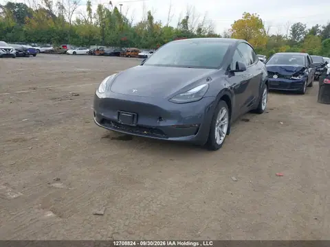 LRWYGDEE9PC163035 — 2023 Tesla Model Y Long Range, фото 2 с аукциона IAAI 23.10.2026, Подтопление