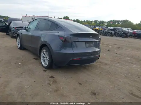 LRWYGDEE9PC163035 — 2023 Tesla Model Y Long Range, фото 3 с аукциона IAAI 23.10.2026, Подтопление