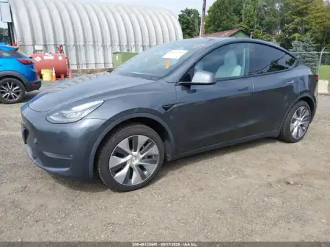 5YJYGDEE4MF080906 — 2021 Tesla Model Y, foto 2 de IAAI 02.10.2026, Inundación de agua dulce