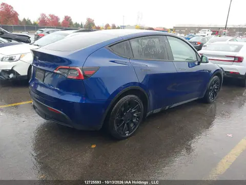 7SAYGDEE0NF484130 — 2022 Tesla Model Y, photo 4 from IAAI 23.10.2026, Left rear