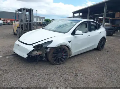 7SAYGDEF3NF417059 — 2022 Tesla Model Y, фото 2 з IAAI, Пошкодження з усіх боків