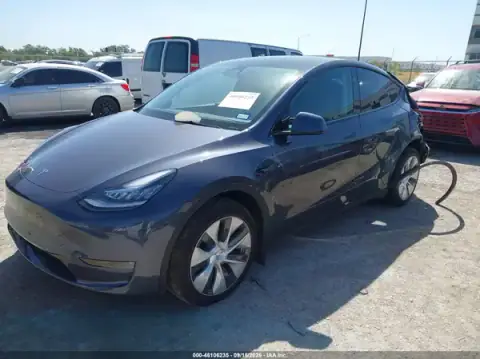 7SAYGDEE4PA150845 — 2023 Tesla Model Y, zdjęcie 2 z IAAI 30.09.2026, Przód i tył