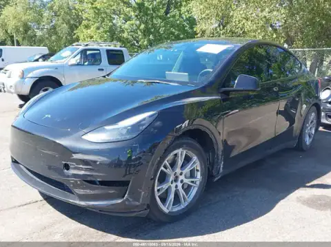 7SAYGAEEXPF770696 — 2023 Tesla Model Y, фото 2 з IAAI, Лівий бік