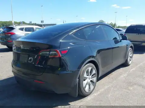7SAYGAEEXPF770696 — 2023 Tesla Model Y, фото 4 з IAAI, Лівий бік