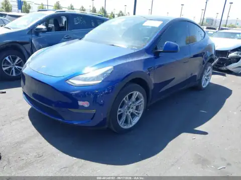 7SAYGDEE3PA094011 — 2023 Tesla Model Y, photo 2 from IAAI 26.09.2026, Left rear