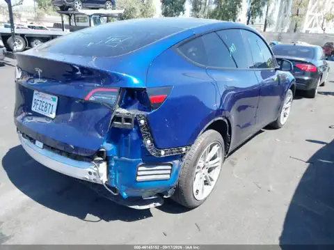 7SAYGDEE3PA094011 — 2023 Tesla Model Y, photo 4 from IAAI 26.09.2026, Left rear