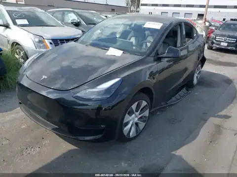 7SAYGAEE9PF836834 — 2023 Tesla Model Y, photo 2 from IAAI 17.10.2026, Left rear