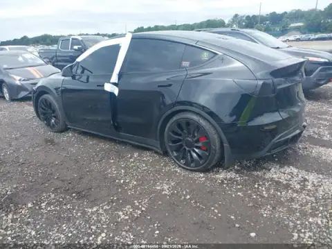 7SAYGDEF0PF922348 — 2023 Tesla Model Y, foto 3 de IAAI, Inundación