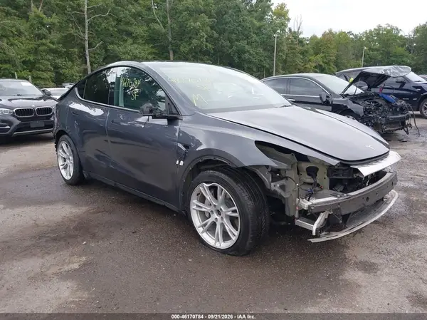 7SAYGDEE0PA040309 Tesla Model Y 2023 — uszkodzenie Przód i tył, zdjęcie przed naprawą