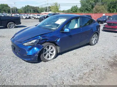7SAYGAEE6PF829842 — 2023 Tesla Model Y, photo 2 from IAAI, Left side
