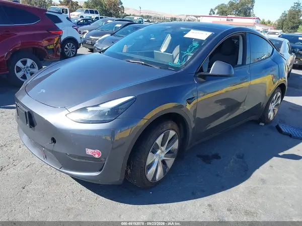 7SAYGDED7PF977409 — 2023 Tesla Model Y, photo 2 from IAAI, Rear end