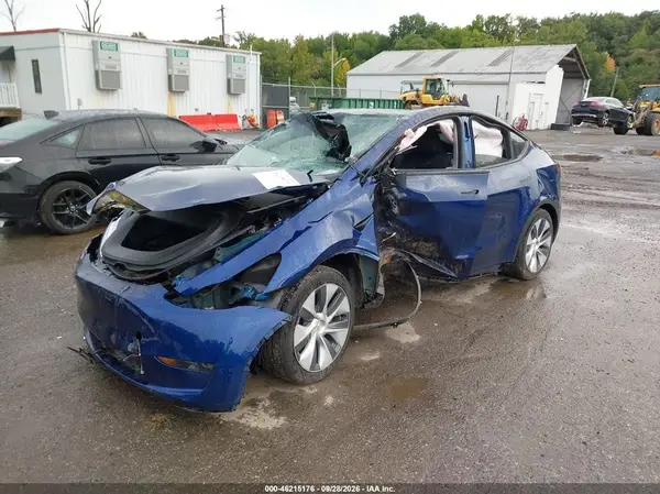 7SAYGDEE0PA059040 — 2023 Tesla Model Y, foto 2 de IAAI, Lado izquierdo