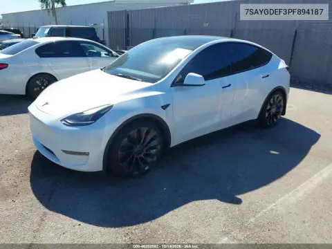 7SAYGDEF3PF894187 — 2023 Tesla Model Y, photo 2 from IAAI, Flood