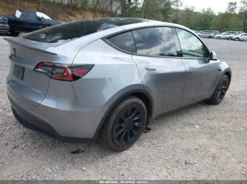 7SAYGDEE2RA328416 — 2024 Tesla Model Y, photo 4 from IAAI 22.09.2026, Left side