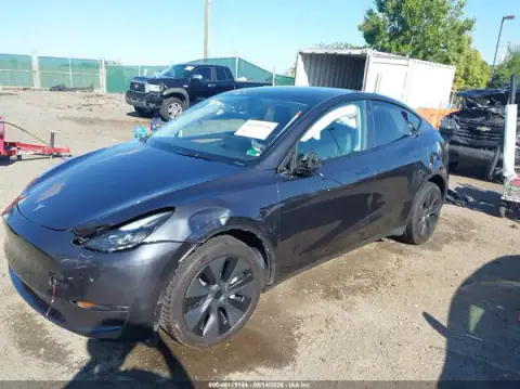 7SAYGDEE1RA308304 — 2024 Tesla Model Y, ფოტო 2, IAAI 23.10.2026, წინა მარცხენა ნაწილი