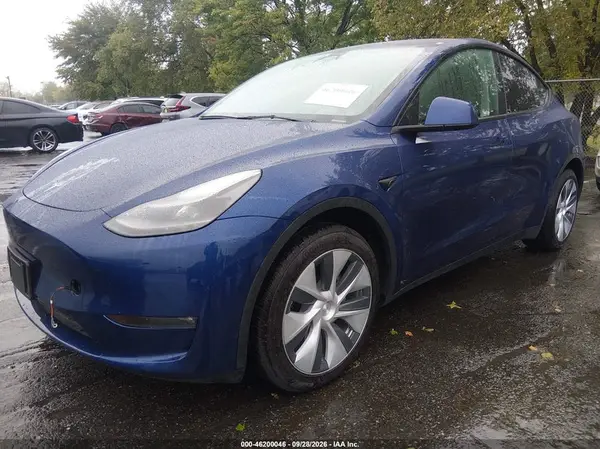 7SAYGDEE2RF031861 — 2024 Tesla Model Y, photo 2 from IAAI, Flood