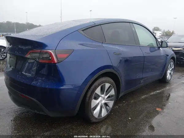 7SAYGDEE2RF031861 — 2024 Tesla Model Y, photo 4 from IAAI, Flood