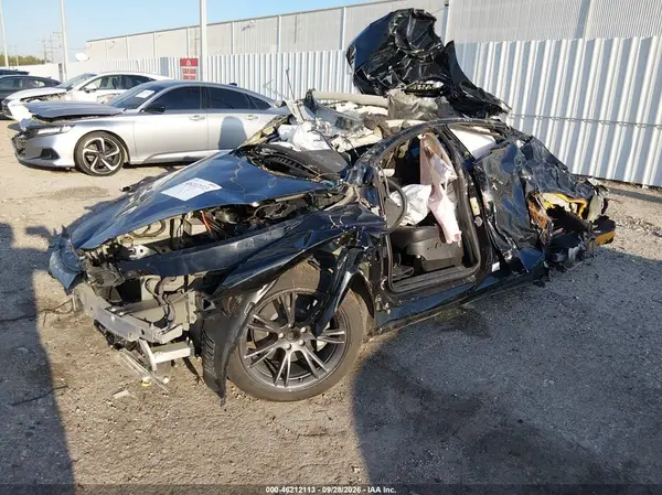 7SAYGDED2SA374325 — 2025 Tesla Model Y, foto 2 de IAAI, Vuelco