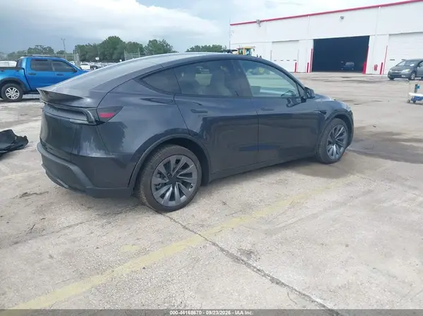 7SAYGDED4TA642261 — 2026 Tesla Model Y, photo 4 from IAAI, Left rear
