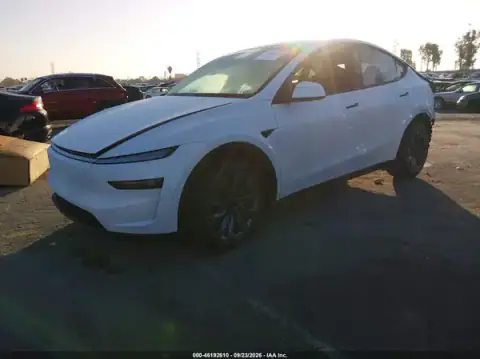 7SAYGDED9TF643103 — 2026 Tesla Model Y, photo 2 from IAAI, Rear end