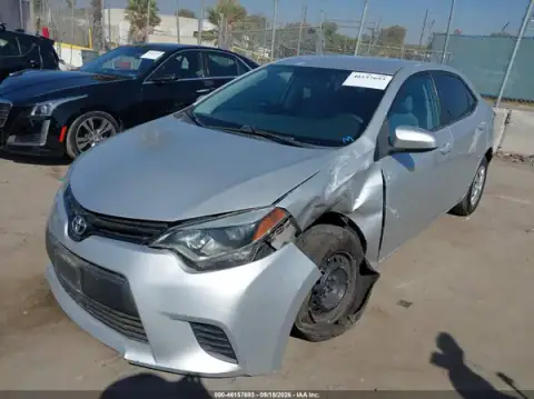 5YFBURHE4GP394474 — 2016 Toyota Corolla, фото 2 з IAAI 21.10.2026, Передня частина зліва