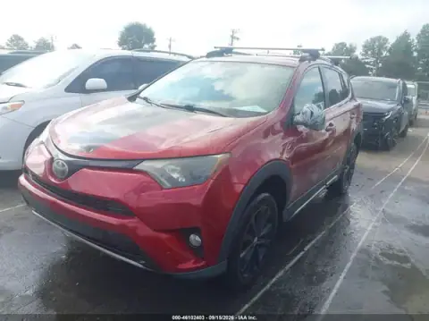 2T3RFREV6JW730328 — 2018 Toyota RAV4, photo 2 from IAAI, Rear end