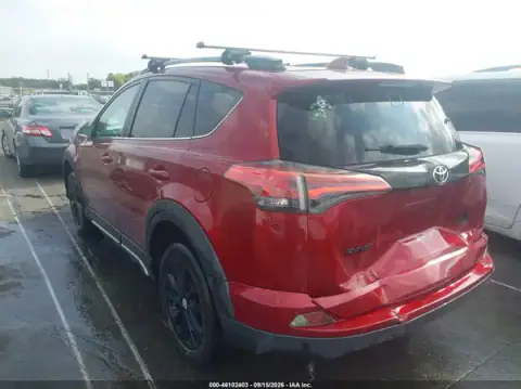 2T3RFREV6JW730328 — 2018 Toyota RAV4, photo 3 from IAAI, Rear end