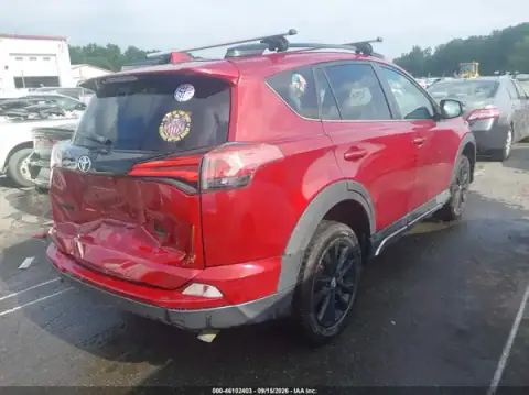 2T3RFREV6JW730328 — 2018 Toyota RAV4, photo 4 from IAAI, Rear end