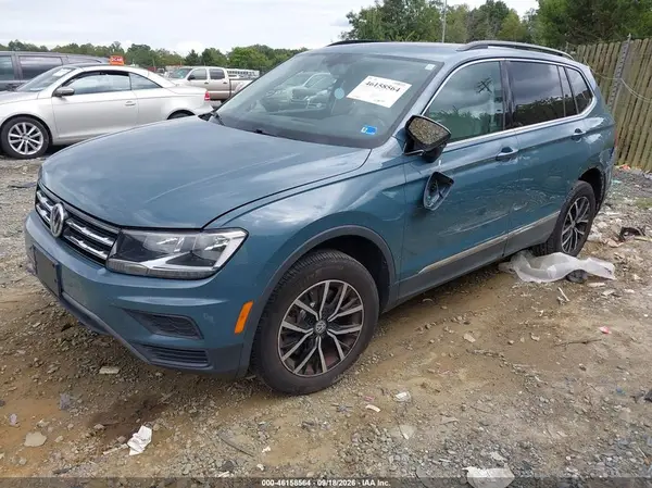 3VV2B7AX7MM050633 — 2021 Volkswagen Tiguan, photo 2 from IAAI 12.10.2026, Rear end
